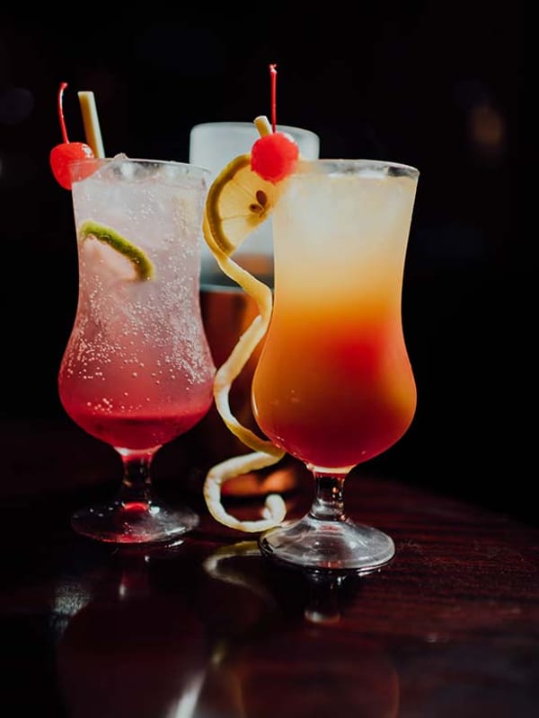 Two bright, fruit-forward drinks served without alcohol