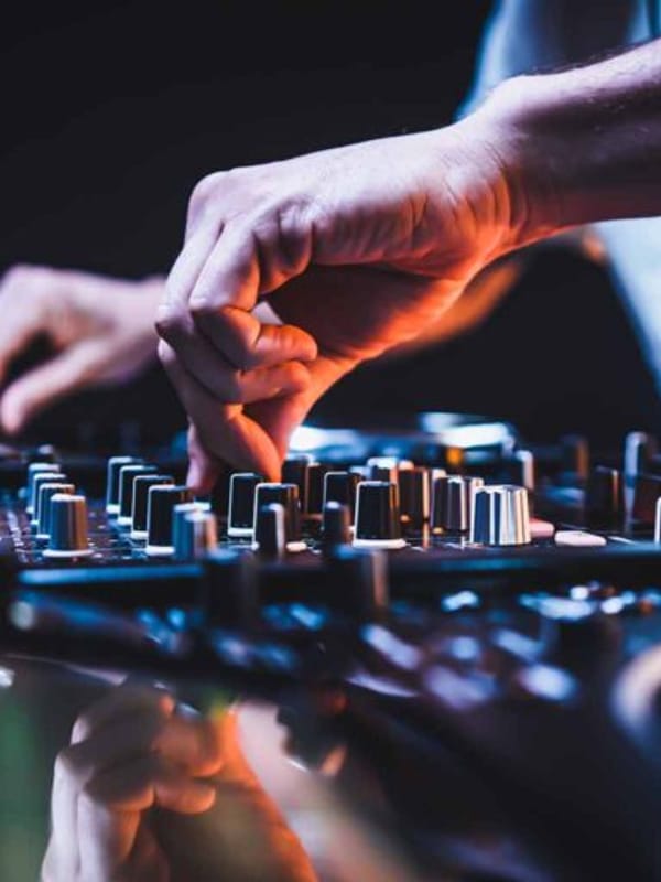 The decks and lights set for a music night at OneAfrika